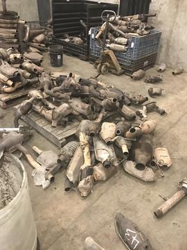 SMASH Recycling | Pile of Used Catalytic Converters for Scrap Metal Recycling