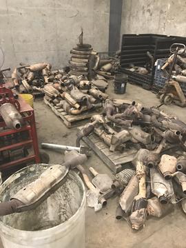 smashrecycling | Pile of Used Catalytic Converters Ready for Recycling