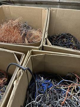 Scrap Metal Recycling: Sorted Wires and Cables in Cardboard Boxes